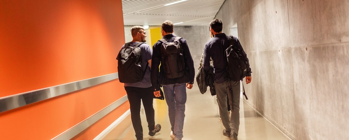 Desk with monitor, computer and codeing